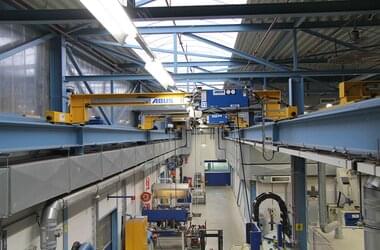 Overhead travelling crane with lifting capacity of 1 t is used as hoist 