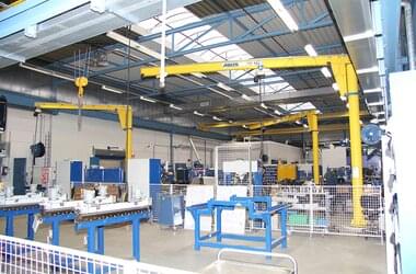 ABUS jib cranes in use at the workplace for the construction of components of various trains 