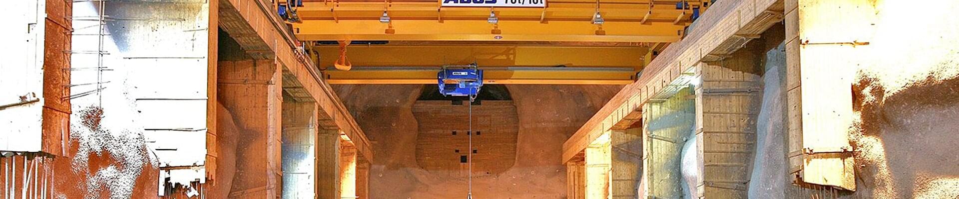 Double-girder overhead traveling crane in box girder design with a load capacity of 75 t and a span of 12.5 m at a utility company in Norway