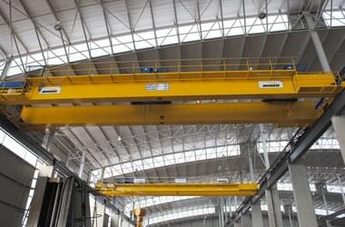 Double-girder travelling cranes with lifting capacities between 10 and 64 t