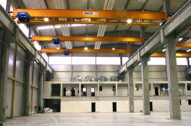 3 single girder travelling cranes type ELK on a crane runway in company Harburg-Freudenberger Group
