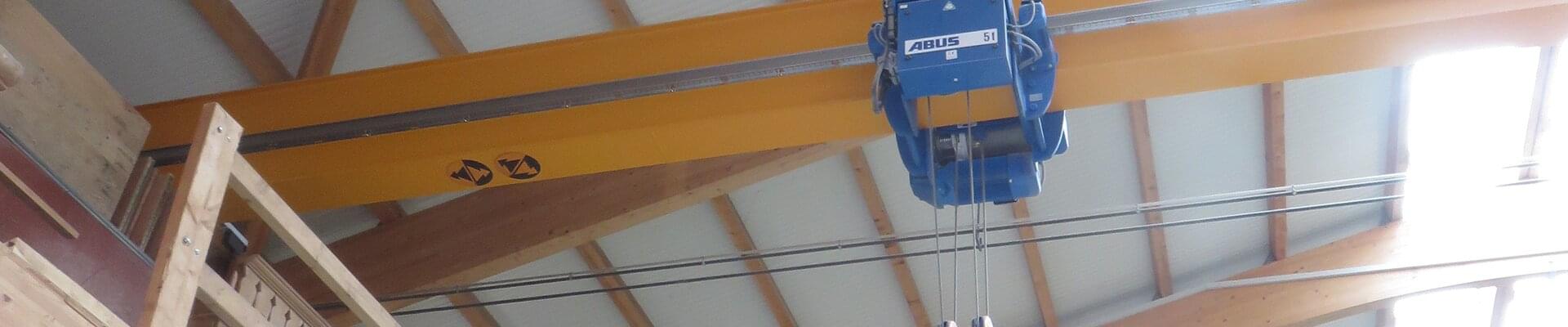 ABUS cranes active in companies for a wide range of woodwork in Switzerland