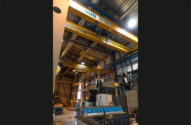 Travelling cranes for production of various product pallets in company Konnepaja Enne Oy