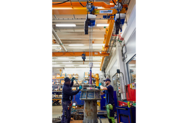 Underslung travelling crane with 2 electric chain hoists in Xylem company in Sweden