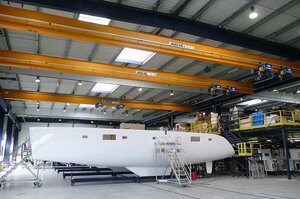 3 Assembled single girder travelling cranes in production hall in France