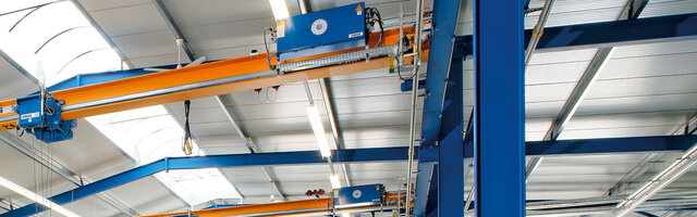 The control components of a crane system are mounted on the girder and control the movements of the system.
