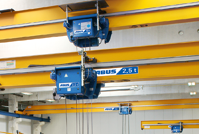 ABUS Type E monorail trolley for compact material handling and efficient crane technology in industry.