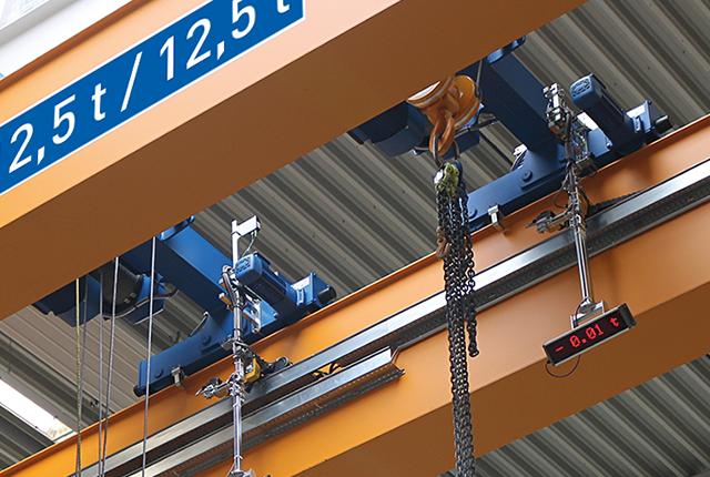 ABUS Type D double-rail trolley on a crane system with a chain hoist and a lifting capacity of up to 63 tonnes.