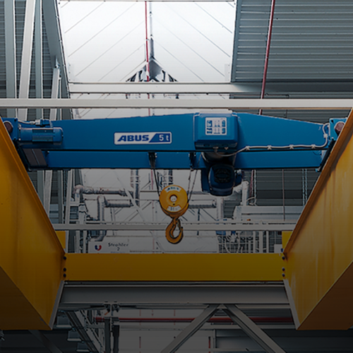 ABUS DQA-type double-girder trolley with a load capacity of up to 40 tonnes between two crane girders.